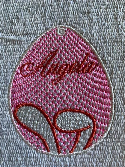 Pink Easter bunny egg sketch embroidery design personalized with the name Angela