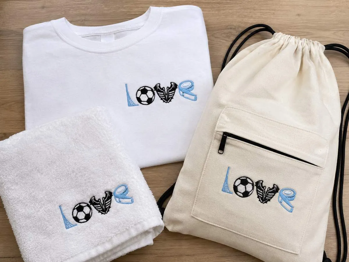 Love Soccer embroidery design with soccer details for shirts, towels, totes, and player gifts.
