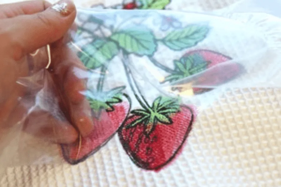 Remove the top piece after completing the embroidery.