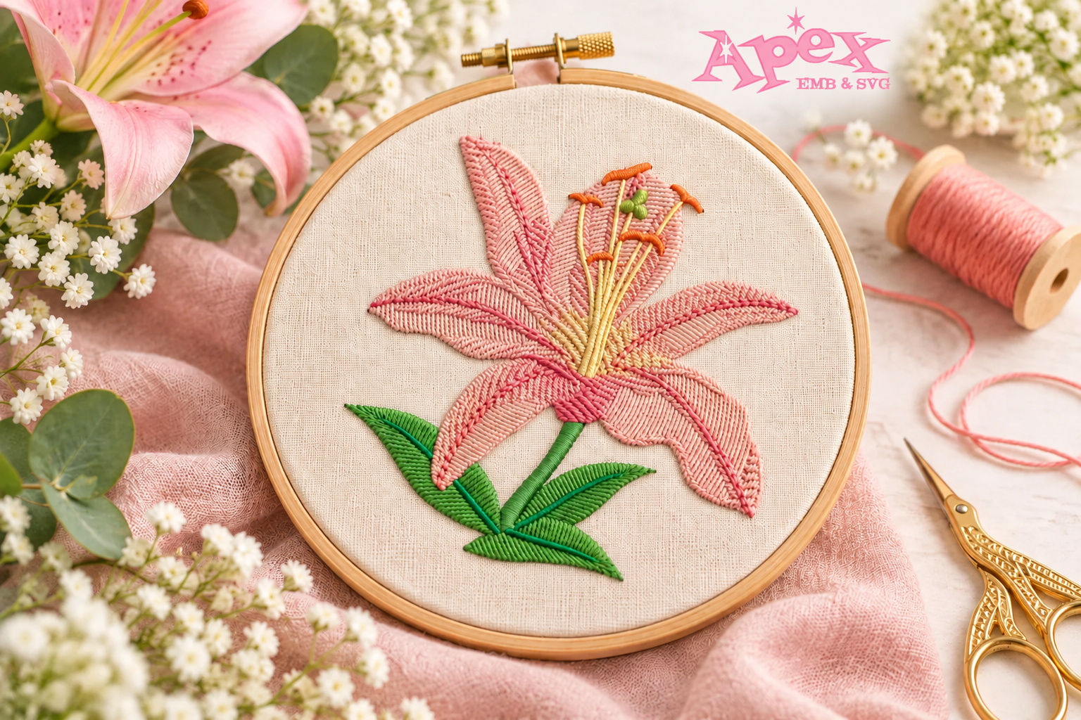 Pink watercolor lily embroidery design stitched in an embroidery hoop