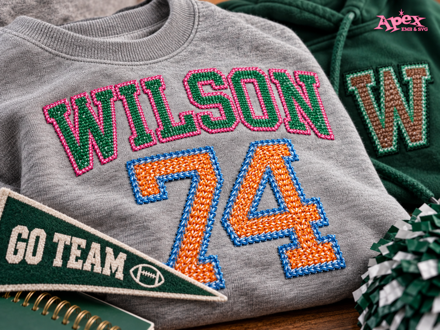 Football game day embroidery design on green school spirit hoodie
