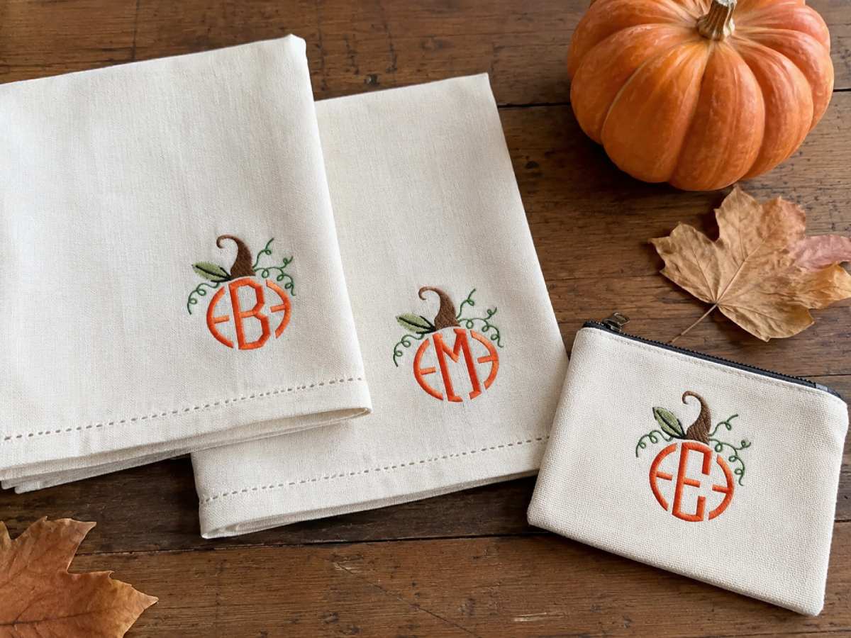Pumpkin monogram embroidery makes small fall gifts feel custom without overwhelming the design.