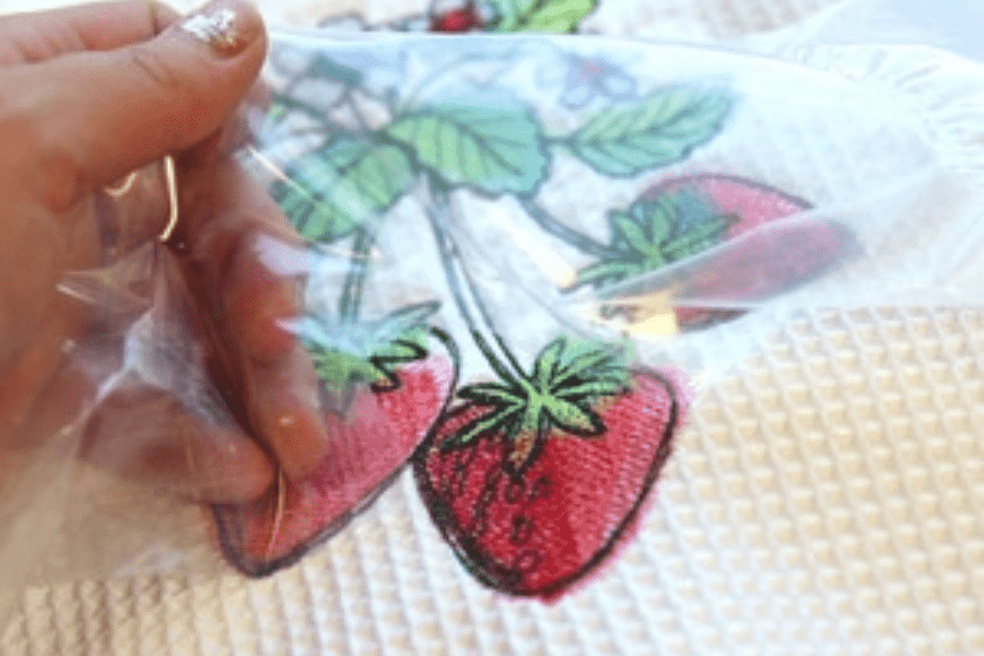 Remove the top piece after completing the embroidery.