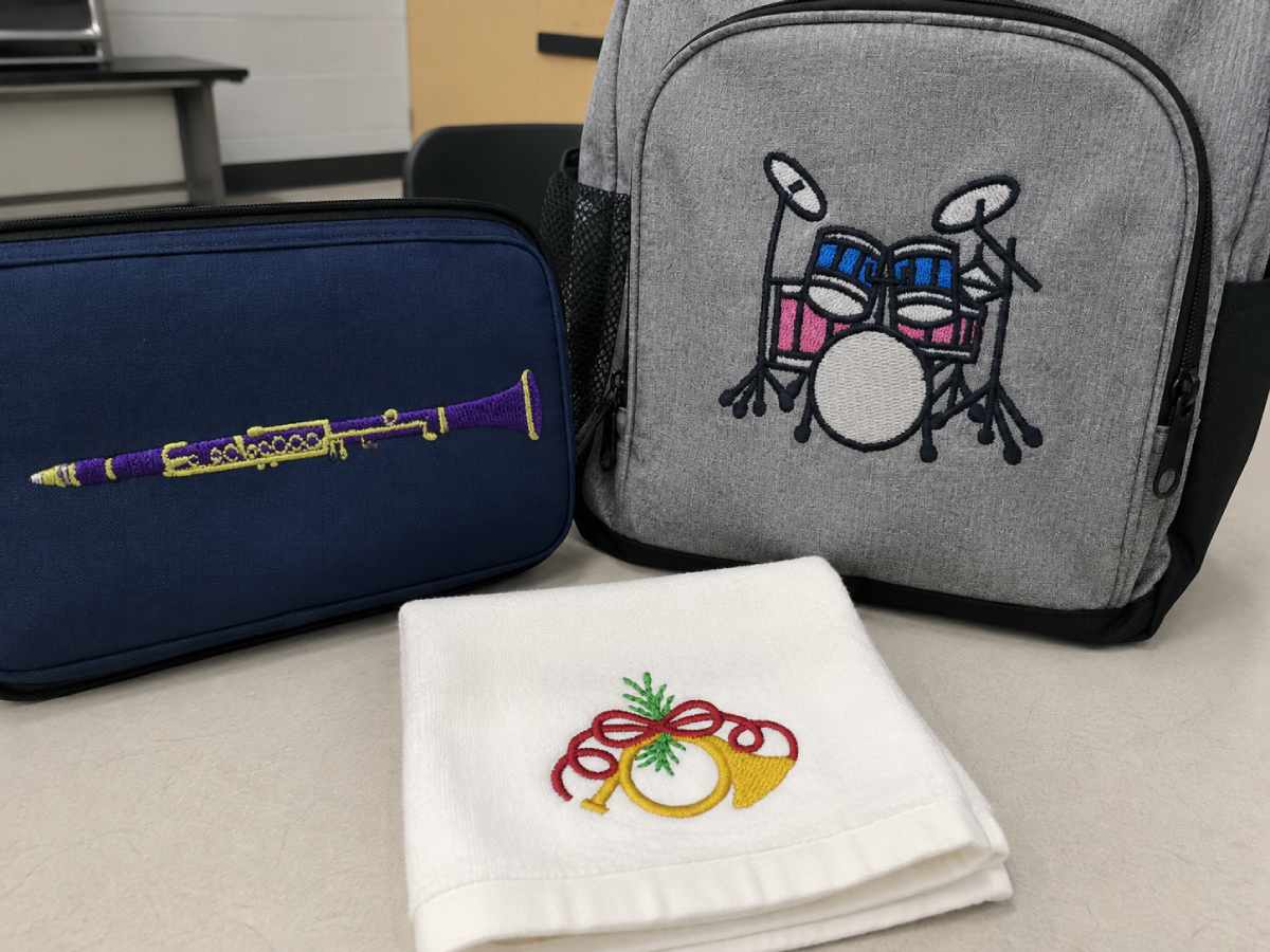 Examples from the collection: Clarinet Embroidery Design, Little French Horn Embroidery Design and Drum Kit Embroidery Design.