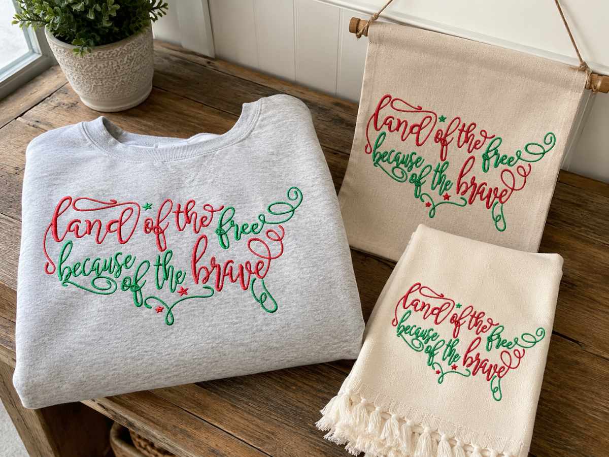 The LAND of the FREE Embroidery Design has a clear, emotional phrase: “LAND of the FREE - Because of the BRAVE.”