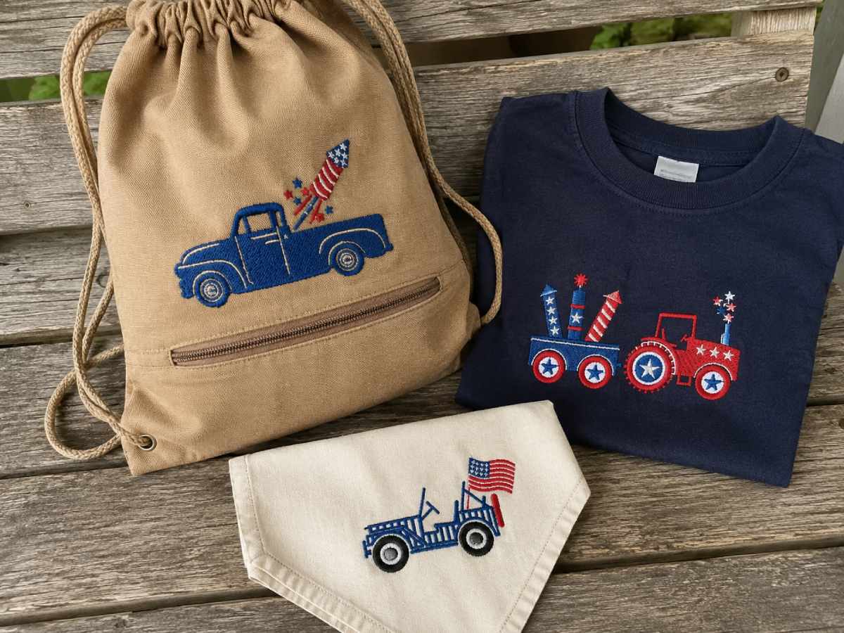 Patriotic vehicle embroidery designs stitched on a drawstring bag, kids’ shirt, and bandana for country-style summer projects.
