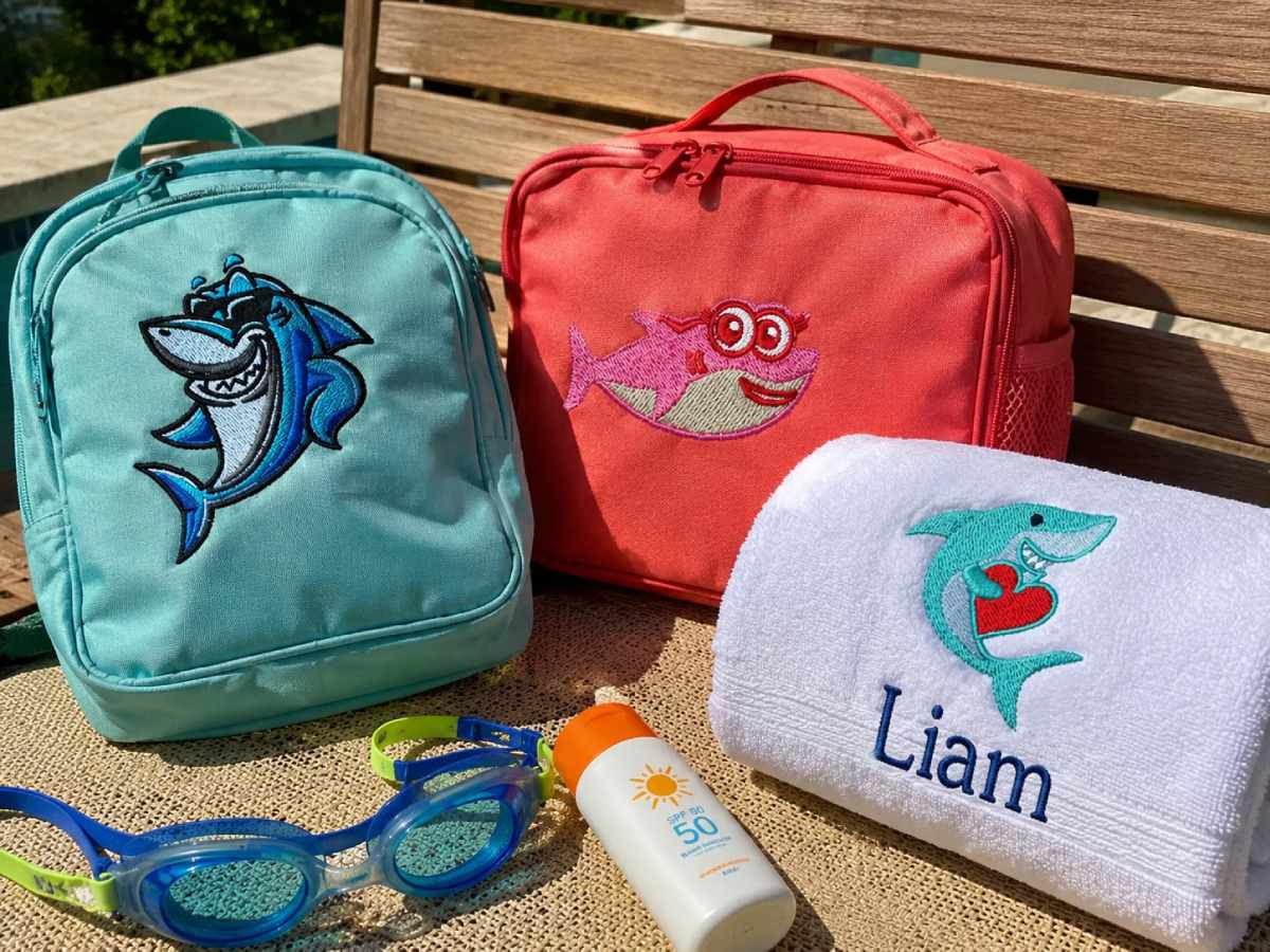 Cute shark embroidery designs add playful personality to kids’ towels, lunch bags, and backpacks.
