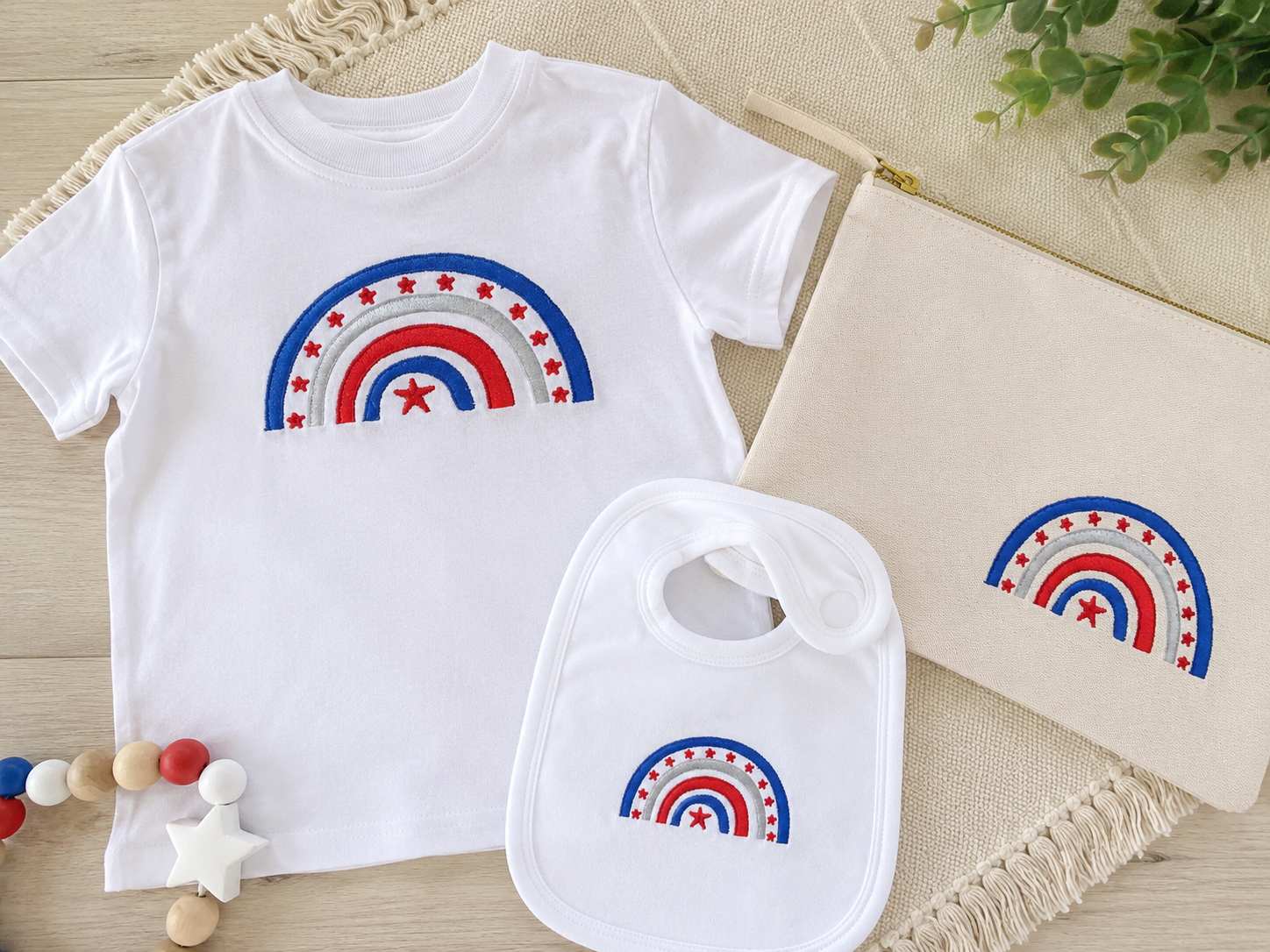Instead of a standard flag layout, this design uses a rainbow form with red-white-blue details.